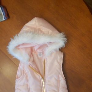 New without tags zip-up vest. Size 5